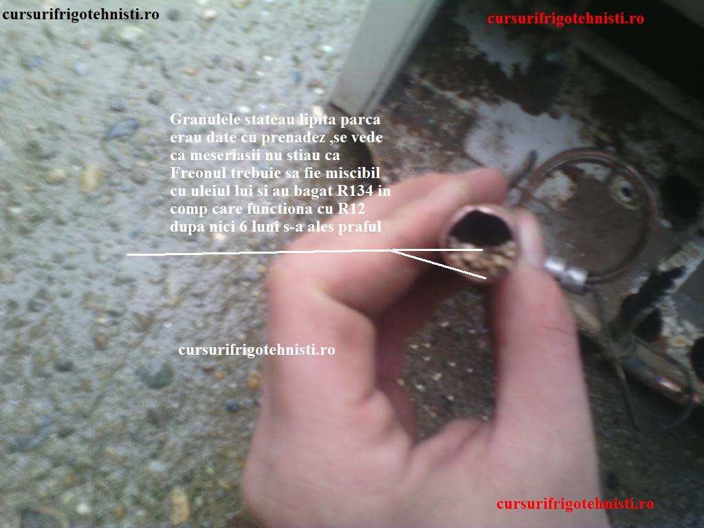 Filtru cu granule lipite din cauza proastei functionari.jpg