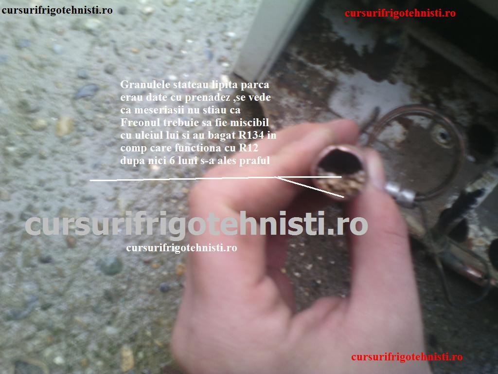 Filtru cu granule lipite din cauza proastei functionari.jpg